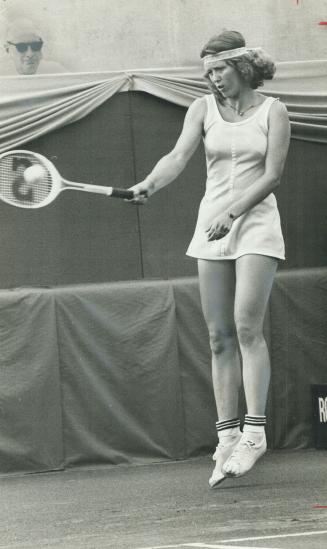 Jumping . . . . but not for joy. Marjorie Blackwood of Ottawa used wrong strategy last night in opening round of Canadian tennis championships, trying(...)