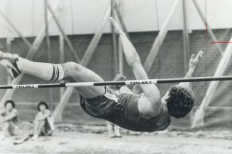 World champion amputee high jumper Arnie Boldt, a 20-year-old University of Saskatchewan track team competitor, shows form to consistently clear bar a(...)