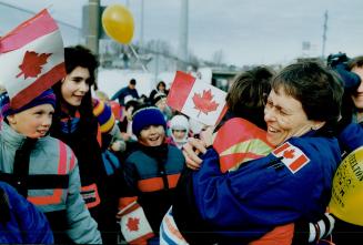 Sault welcome: Warm bearhugs enveloped Roberta Bondar in her hometown after Discovery's voyage - much more comforting than her bunk in the shuttle