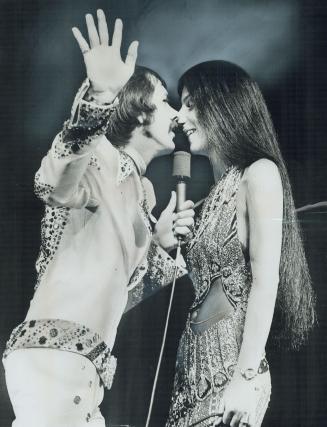 Television favorites Sonny and Cher closed this year's services of major stars at the CNE Grandstand with an easy to take show Saturday night, says cr(...)