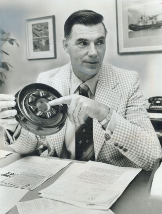 New ash tray, Toronto Fire Department is suggesting the public should use is held by Fire Chief Ben Bonser