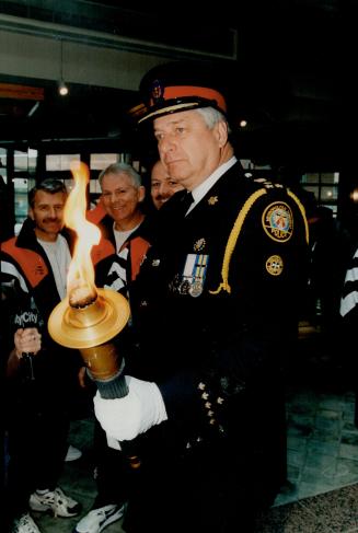 Metro Police Chief David Boothby with Special Olympic torch