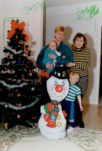 Happy family: Leafs' Nikolai Borschevsky, wife Lena and sons Valery, 2, and Nikolai are preparing for a Merry Christmas after his near-fatal spleen injury