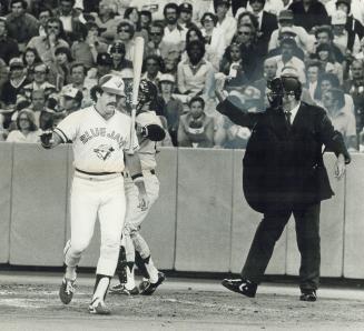 Jay's Rick Bosetti flips bat away angrily after striking out against crafty Yankee veteran Luis Tiant