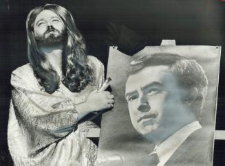Image shows a Beauty Queen sings to portrait of Joe Clark at annual City Hall Revue. 