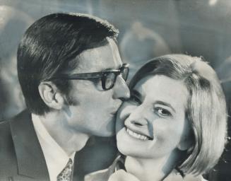 Triumphant, Robert Bourassa kissed his wife, Andree, on his election as Quebec premier in 1970