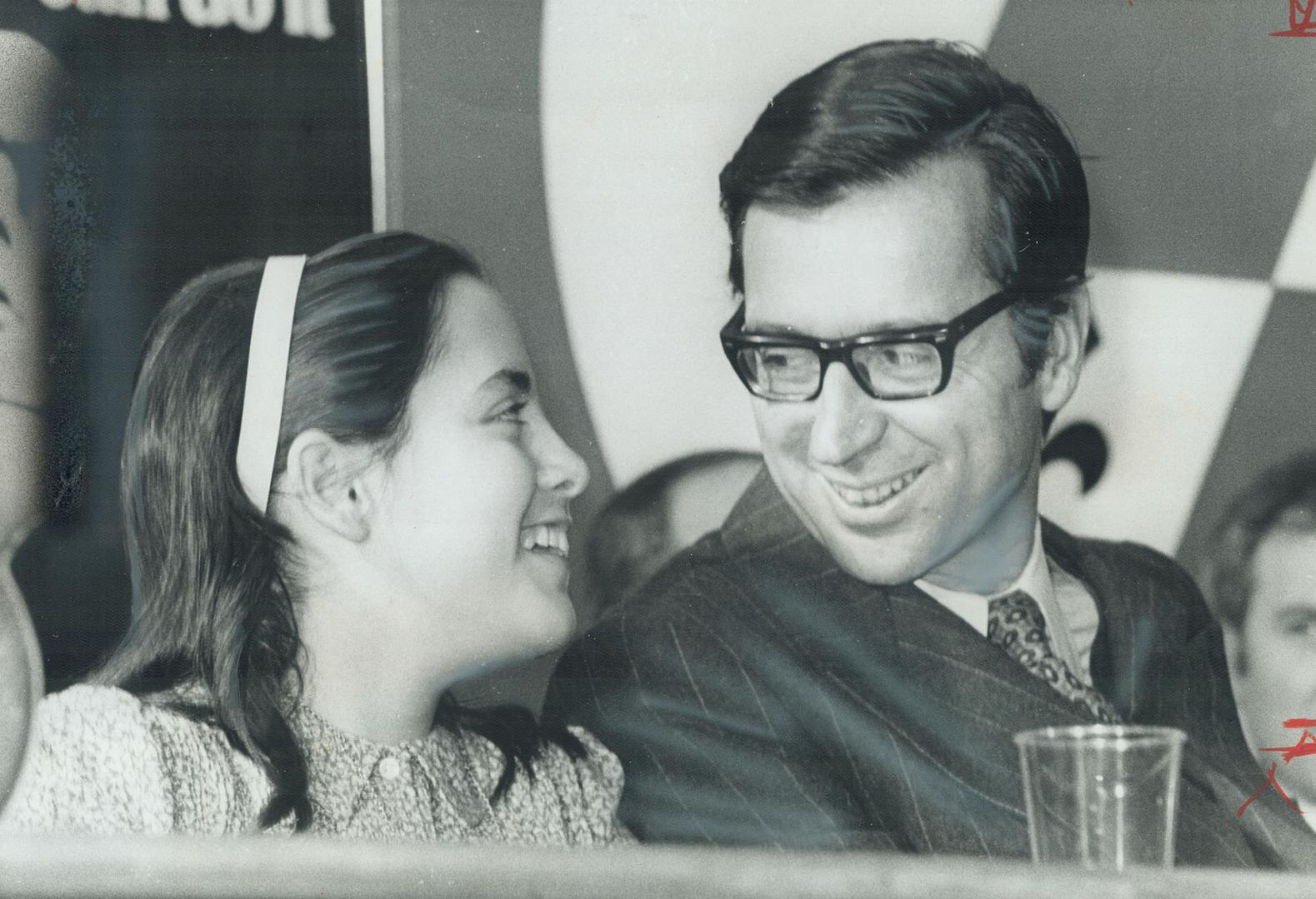 Smiling at daughter, Michele, 9, Quebec Premier Robert Bourassa