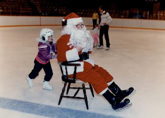 Help for Santa: That's Shannon Maxwell again, giving it her all to to give Santa a push