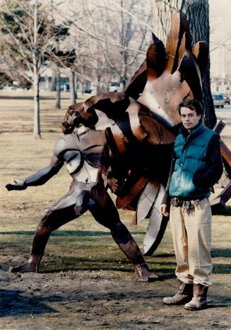 Artist Peter Bowyer with his sculpture Statuary from an opera of intoxication 1982-83 at Queens Park