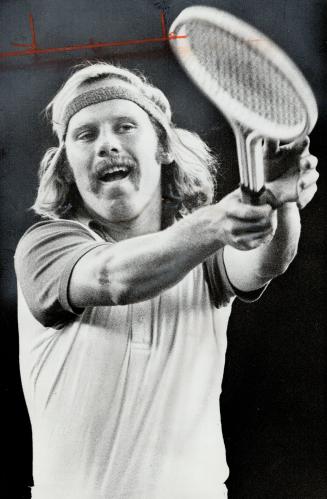 Preparing for cup play: Canadian champion Jim Boyce practises at Toronto's Downtown Tennis Club