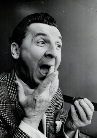 Eddie Bracken turns himself into one of the characters he plays in You Know I Can't Hear You When the Water's Running at the O'Keefe Centre. Bracken a(...)