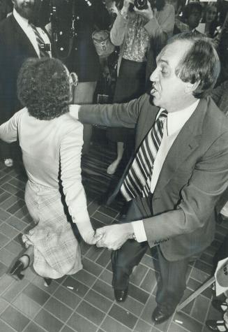 NDP Leader Ed Broadbent does a jig with supporter Clara Burn in Gander, Nfld