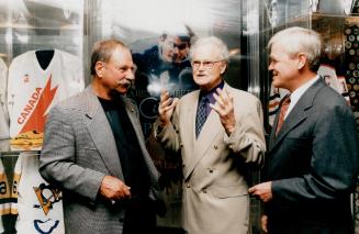 Dave Broadfoot (centre), Eddie Shack, Dr. Robert Phillips