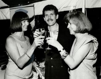 Cheers: Designer Marilyn Brooks, above left, with Heather Reid and Graham Morris at Bonne Bell anniversary party