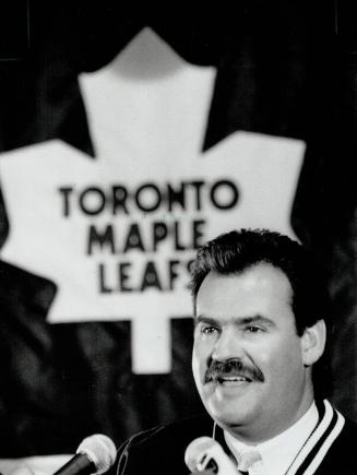 New leaf coach: Pat Burns meets the press yesterday at the Gardens after being named the 22nd coach in the history of the Maple Leafs