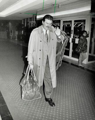 Checking in: Canadiens coach Pat Burns arrives at his hotel yesterday as the Habs get ready to take on Leafs