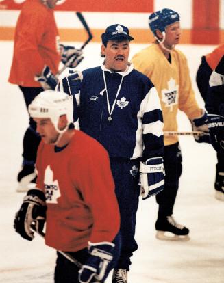 Chicago bound: Leafs captain Wendel Clark (l) is apparently ready to rejoin coach Pat Burns (r) and his teammates for game tomorrow