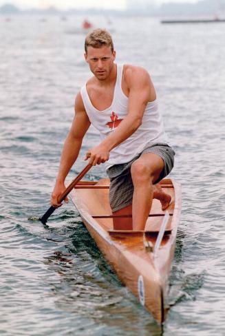 Barcelona bound. Canadian canoeist Larry Cain puts the finishing touches on his stroke yesterday at Balmy Beach before leaving for spain