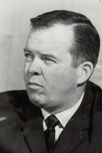 Leo Cahill, new Argo coach, wears determined look as he outlines plans for coming season