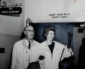Dorothy Cameron leaving court with Dr. T. Heinrich.