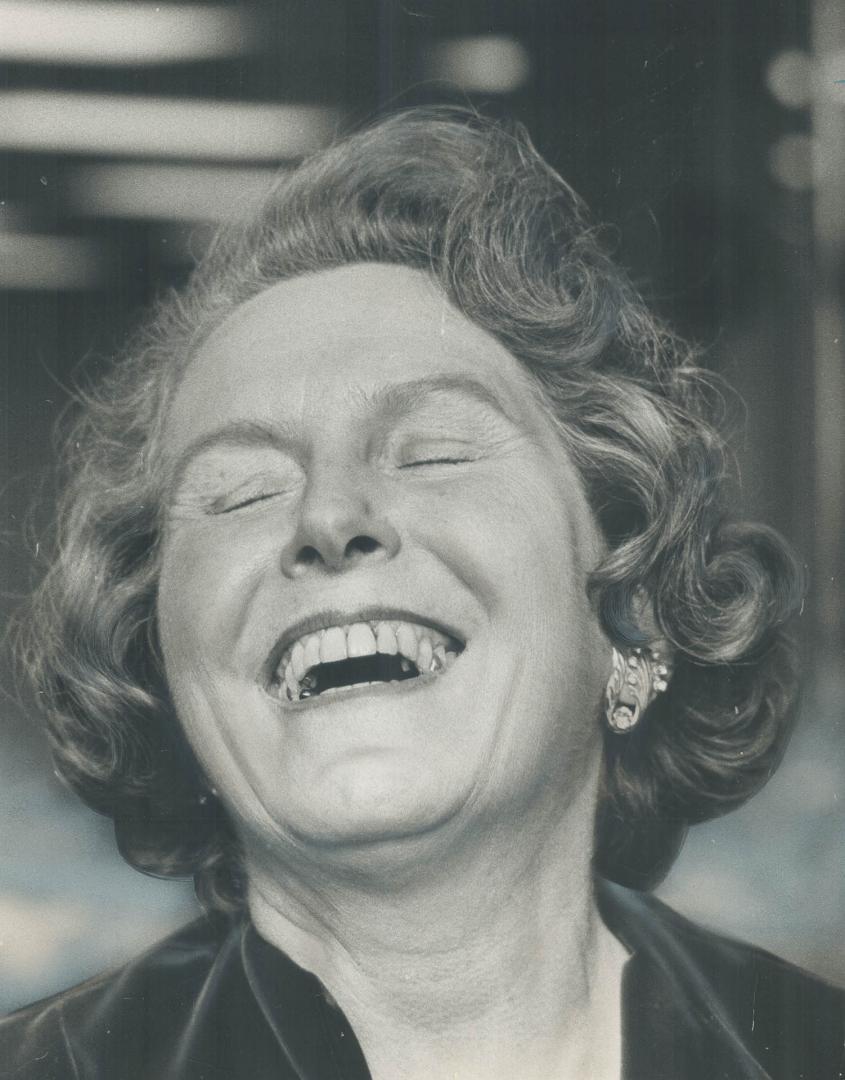 Deliriously happy, Mrs. Margaret Campbell celebrates her tight victory for the fourth Board of Control berth. She edged out former Alderman George Ben