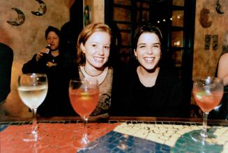 Neve Campbell (Right) and Andrew Taylor