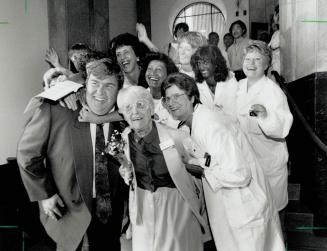 Starring John Candy. Staff at St. Michael's Hospital are thrilled to pose with movie star John Candy during a ceremony yesterday launching a Book of N(...)