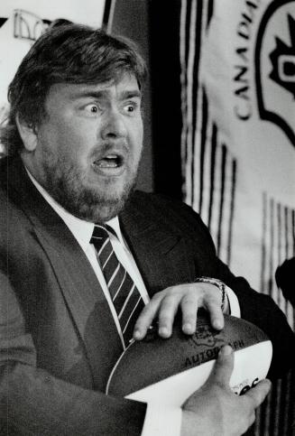 It's a promise: Comedian John Candy promises to attend all of the Argos' home games and to try to get the team back into the public eye