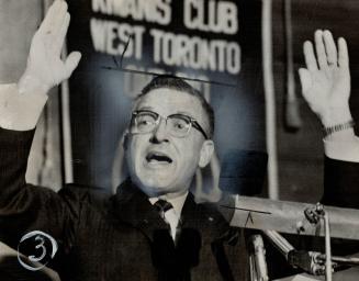 Real Caouette gesticulates at West Toronto Kiwanis Lunheon