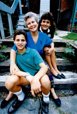 Paula Caplan - shown with daughter Emily, 14, and son Jeremy, 15 - is exploding the myths about mothers