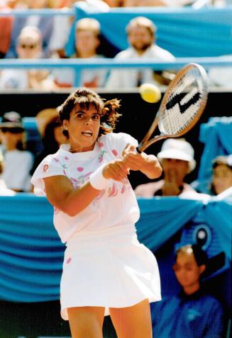 Dead solid perfect: Teen sensation Jennifer Capriati shows the slugger's style that gave her a 65-minute triumph in yesterday's final