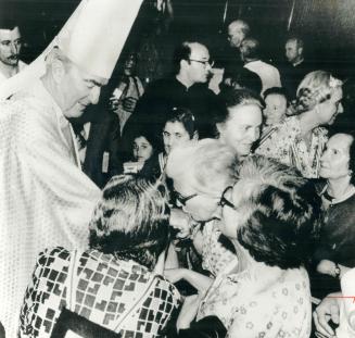 Toronto's Cardinal Carter is greeted by parishioners of Santa Maria In Transpontina church