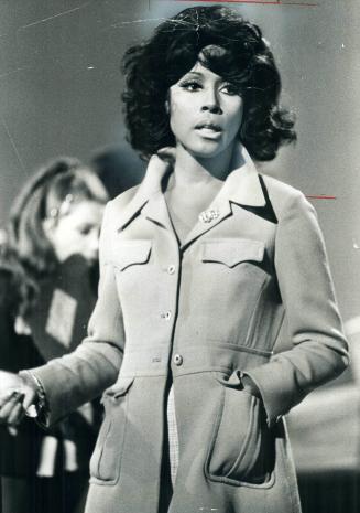 Diahann Carroll. It's her eyes, mouth and mannerisms