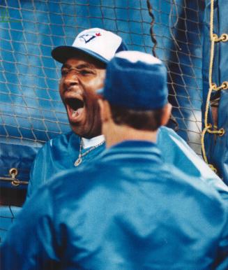 Late night, Joe? Outfielder Joe Carter is caught yawning at yesterday morning's SkyDome battling practice