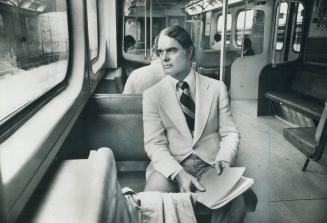 Gordon Carton, provincial transporation minister, rides the subway to work each day