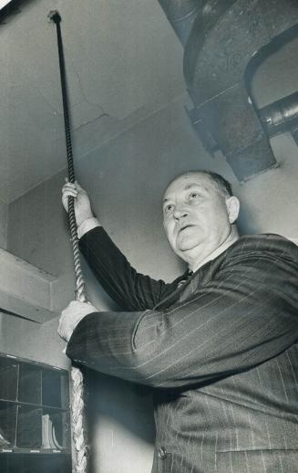 Little Trinity Church bell rings out the last moments of 1971, tolled by Toronto Fire Chief Charles Chambers