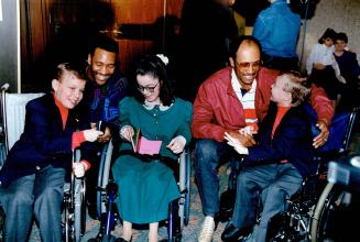 They're all stars: Joe Carter, left, and hall-of-fa-mer Fergie Jenkins, kick off the Easter Seals Campaign yesterday with 1991 Tammy, Colleen McKane, and twin Timmys, Joshua (left) and Jeremy Davis