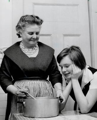 Mrs. Chambers, daughter Carol, New Judge is Equally at Home in the Kitchen