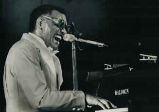 Singer-Pianist Ray Charles comes to Massey Hall next Friday night, and Star staff writer Peter Goddard went down to Cherry Hill this week to interview the man who has been called a genius