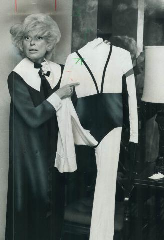 Rudi Gernreich made this exercise suit Carol is holding