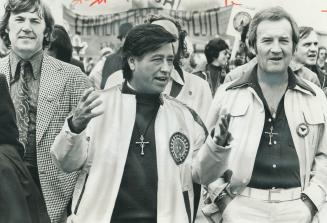 Rallying Canadian support for the grape and lettuce boycott, United Farm Workers leader Cesar Chavez (centre) led a march Saturday in Toronto. He's fl(...)