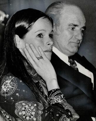 Geraldine Chaplin, movie actress daughter of Charlie Chaplin, sits with Secretary of State Gerard Pelletier at the revival premier of her father's 193(...)
