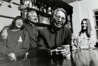 Extended Family: Ho Sze Chow, 66, surrounded by daughter Olivia, son-in-law, Jack Layton, and his daughter Sarah, does much of the household's cooking
