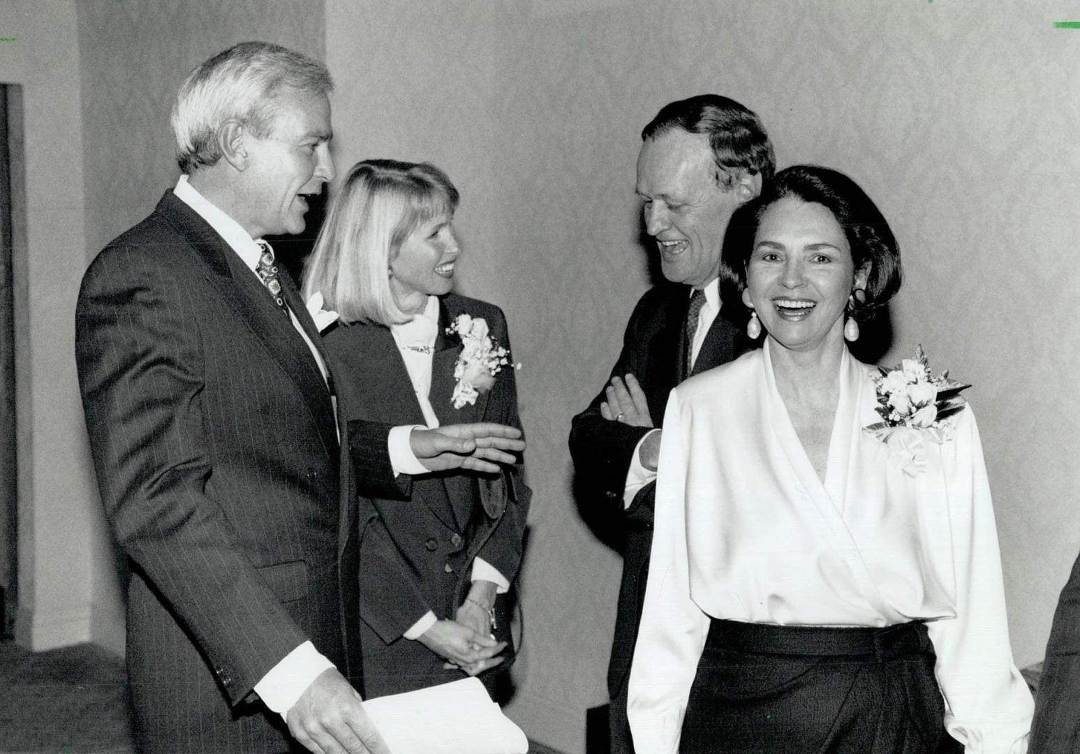 Liberal line-up: Former Ontario premier David Peterson and wife Shelley chat with Liberal Leader Jean Chretien and wife Aline at Sheraton Centre last night