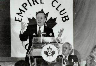 Tax Talk: Liberal Leader Jean Chretien speaks about the GST at Toronto's Empire Club yesterday, while former Ontario premier David Peterson looks on