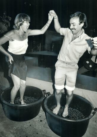 Grape fun! York Borough Mayor Gayle Christie, left, gets into the stomping spirit with a helping hand from Alderman John Nunziata at La Festa dell'Uva(...)
