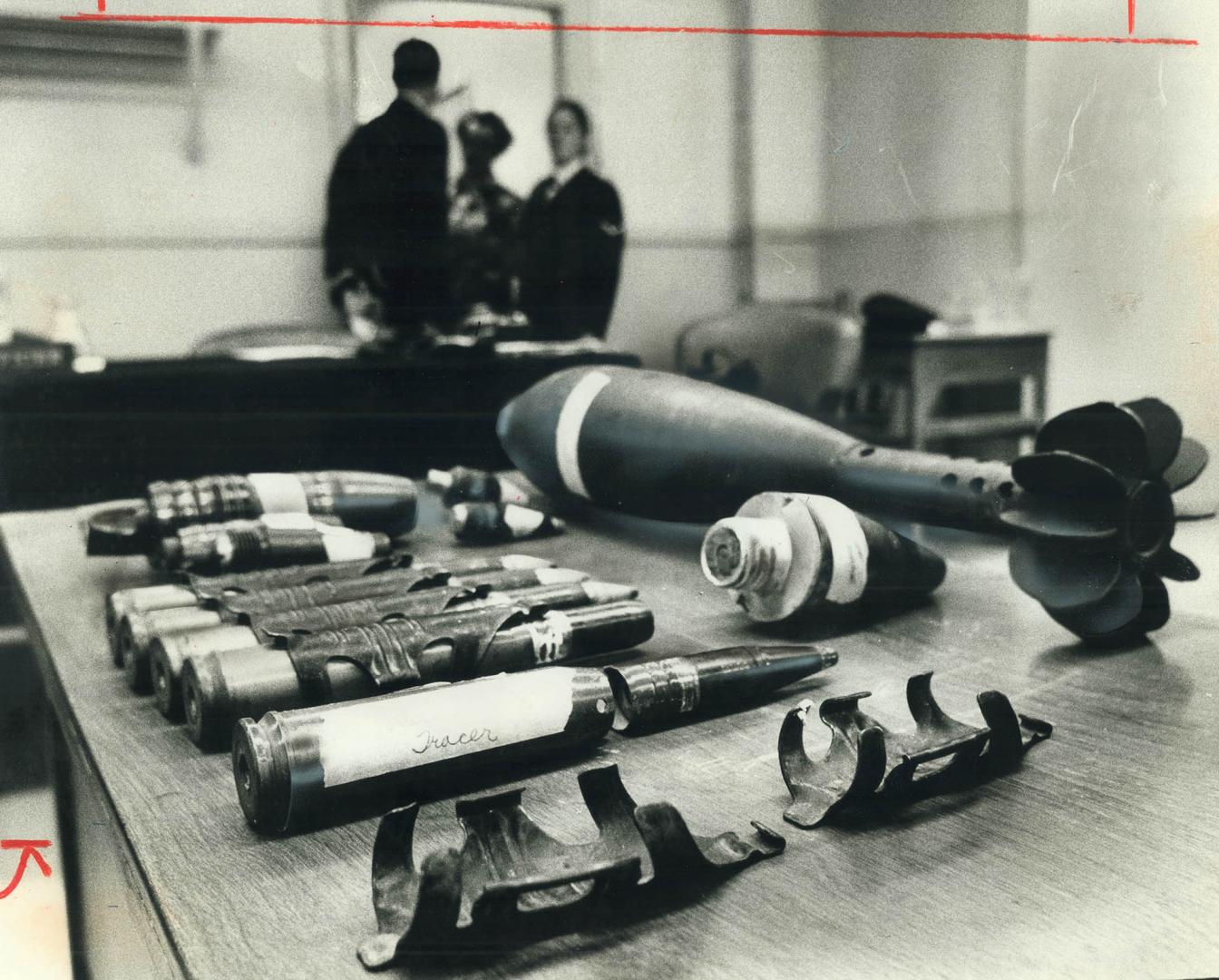 Russian ammunition, including a 23-inch-long mortar bomb (right rear), sent by a Canadian soldier to a friend in Toronto as souvenirs from the Middle (...)