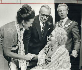 Guild Inn's Rosa and Spencer Clark are congratulated by Social Development Secretary Margaret Birch and Mayor Gus Harris