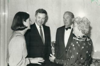 Let me introduce myself . . . Maureen McTeer (left) may be telling U.S. Secretary of State George Shultz and his wife Helena that although she is marr(...)
