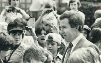 Joe Clark is mobbed by camera-toting children wherever he goes on Parliament Hill